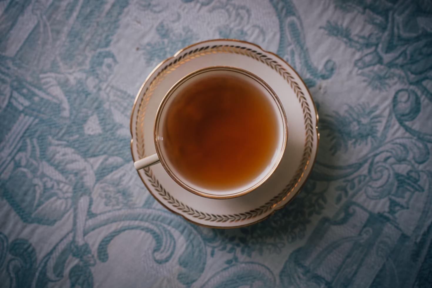 a cup of tea in an elegant white porcelain cup