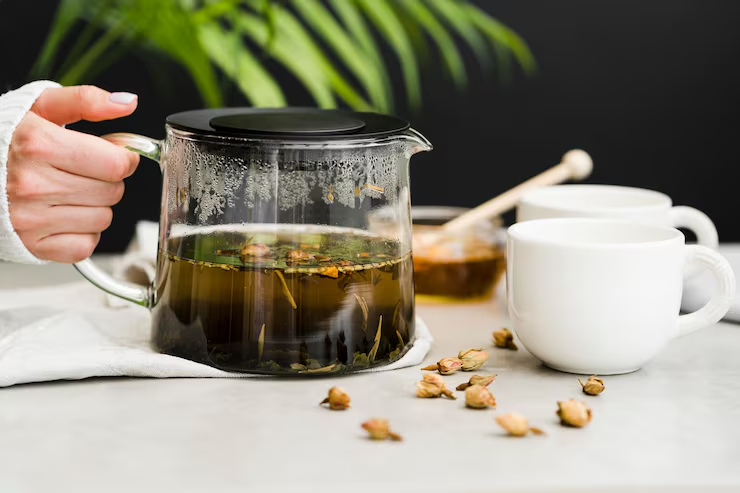 Glass teapot of herbal tea