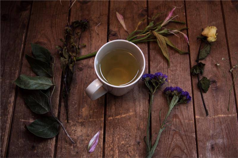 Herbal tea with leaves and flowers
